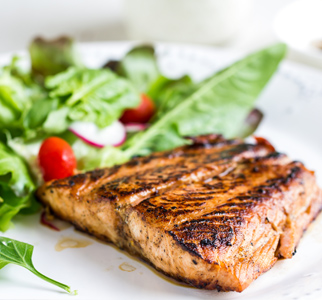Grilled salmon and a salad on a plate